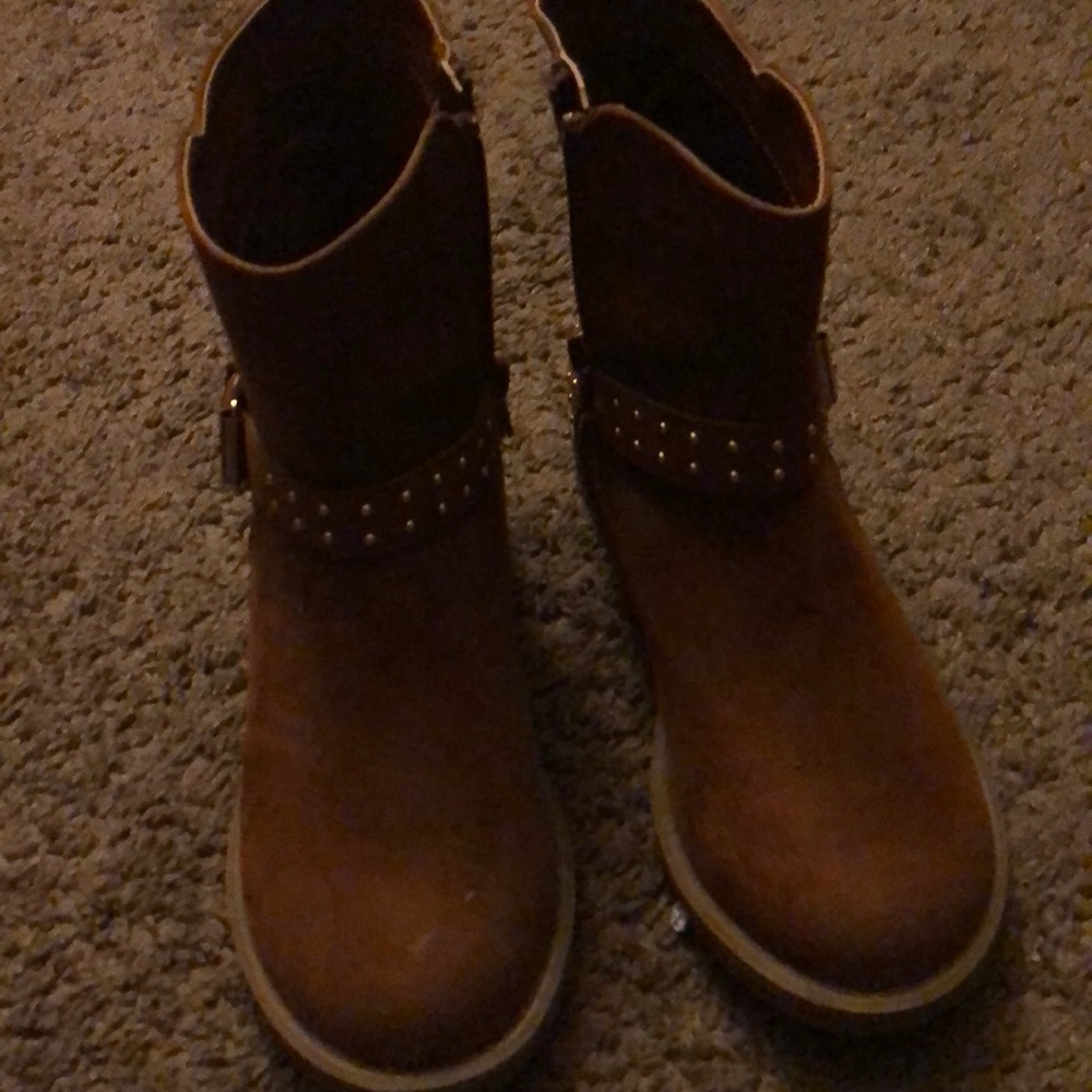 Brown and gold boots
